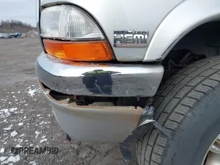 2004 Dodge Dakota SLT with VIN 1D7HG48N04S603763, listed as a IAAI auction lot 41607984 with 157,360 mi miles. Bid and sale history available at carsss.com. Image 6.