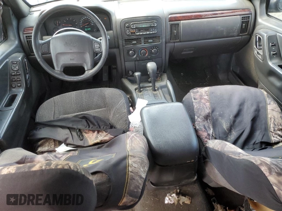 2000 Jeep Grand Cherokee Laredo z VIN 1J4GW48S2YC154627, wystawiony jako Copart lot #54173315 z przebiegiem 251 666 mil mil oraz Szkoda całkowita • Salvage title. Historia ofert i sprzedaży dostępna na DreamBid. Obrazek 8.