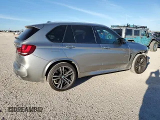 2017 BMW X5 M z VIN 5YMKT6C37H0U39093, wystawiony jako Copart lot #39299614 z przebiegiem 126 868 mil mil oraz . Historia ofert i sprzedaży dostępna na DreamBid. Obrazek 3.