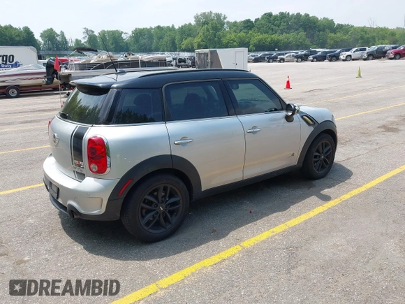2012 MINI Countryman S with VIN WMWZC5C54CWM13119, listed as a IAAI auction lot 42467904 with 115,531 mi miles and . Bid and sale history available at DreamBid. Image 4.