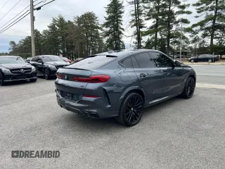 2021 BMW X6 sDrive40i z VIN 5UXCY4C05M9H19479, wystawiony jako Copart lot #54268205 z przebiegiem 85 899 mil mil oraz Czysty tytuł • Clean title. Historia ofert i sprzedaży dostępna na DreamBid. Obrazek 4.