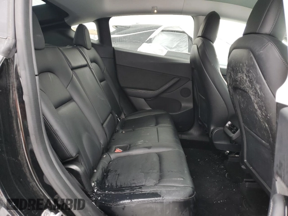 2021 Tesla Model Y Long Range z VIN 5YJYGDEE6MF089008, wystawiony jako Copart lot #45304715 z przebiegiem 140 761 mil mil oraz Szkoda całkowita • Salvage title. Historia ofert i sprzedaży dostępna na DreamBid. Obrazek 11.