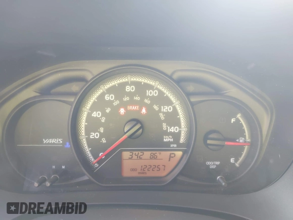 2015 Toyota Yaris L with VIN VNKJTUD35FA054329, listed as a IAAI auction lot 42289132 with 122,257 mi miles and . Bid and sale history available at DreamBid. Image 7.