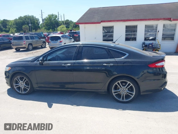 2014 Ford Fusion Titanium with VIN 3FA6P0K9XER216551, listed as a IAAI auction lot 42037004 with 113,857 mi miles and . Bid and sale history available at DreamBid. Image 14.