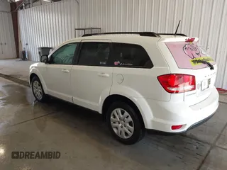 2019 Dodge Journey SE with VIN 3C4PDCBBXKT835029, listed as a IAAI auction lot 42120482 with 130,282 mi miles and . Bid and sale history available at DreamBid. Image 3.
