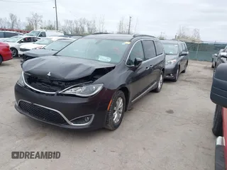 2017 Chrysler Pacifica Touring L with VIN 2C4RC1BG1HR797200, listed as a IAAI auction lot 42044020 with 124,115 mi miles and . Bid and sale history available at DreamBid. Image 17.
