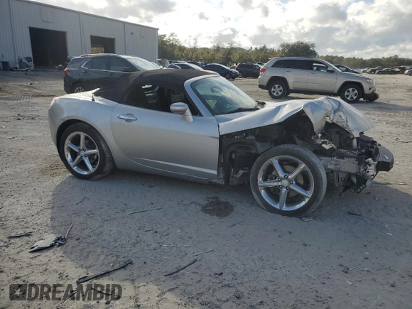 2009 Saturn Sky Red Line z VIN 1G8MT35X69Y104310, wystawiony jako Copart lot #87369754 z przebiegiem 62 428 mil mil oraz Szkody całkowita. Historia ofert i sprzedaży dostępna na DreamBid. Obrazek 4.