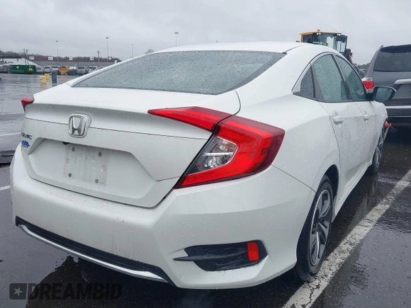 2020 Honda Civic LX with VIN 2HGFC2F66LH510069, listed as a IAAI auction lot 41860480 with 43,639 mi miles and . Bid and sale history available at DreamBid. Image 4.