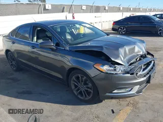 2018 Ford Fusion SE z VIN 3FA6P0H70JR181051, wystawiony jako IAAI lot #41677288 z przebiegiem 59 042 mil mil oraz . Historia ofert i sprzedaży dostępna na DreamBid. Obrazek 1.