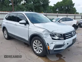 2018 Volkswagen Tiguan S z VIN 3VV1B7AX0JM092116, wystawiony jako IAAI lot #42388339 z przebiegiem 103 412 mil mil oraz . Historia ofert i sprzedaży dostępna na DreamBid. Obrazek 1.