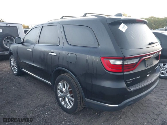 2014 Dodge Durango Citadel with VIN 1C4RDJEG3EC277996, listed as a IAAI auction lot 40517339 with 999,999 mi miles. Bid and sale history available at carsss.com. Image 3.