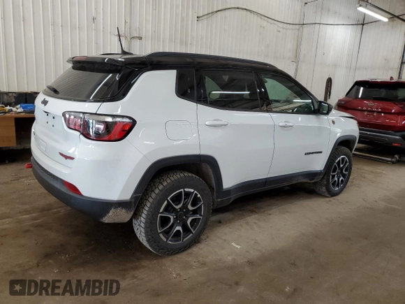 2025 Jeep Compass Trailhawk with VIN 3C4NJDDN8ST529024, listed as a Copart auction lot 61383465 with 4,233 mi miles and Salvage title. Bid and sale history available at DreamBid. Image 3.