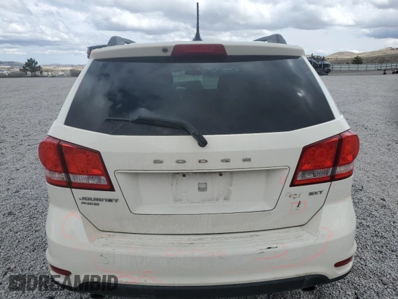 2013 Dodge Journey SXT with VIN 3C4PDDBG1DT619798, listed as a Copart auction lot 51820685 with 209,404 mi miles and Salvage Title. Bid and sale history available at DreamBid. Image 6.