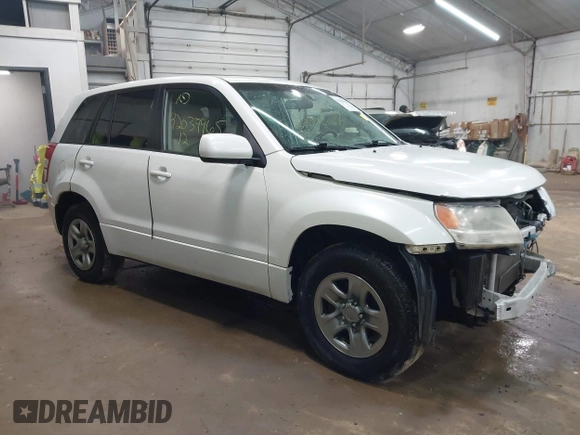 2012 Suzuki Grand Vitara Premium with VIN JS3TD0D26C4100406, listed as a IAAI auction lot 42039965 with 106,671 mi miles and . Bid and sale history available at DreamBid. Image 1.