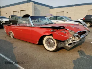 1961 Ford Thunderbird with VIN 1Y73Z116153, listed as a Copart auction lot 70746614 with 83,218 mi miles and Salvage Title. Bid and sale history available at DreamBid. Image 4.