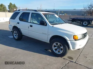 1998 Isuzu Rodeo S z VIN 4S2CK58W4W4308419, wystawiony jako IAAI lot #41560337 z przebiegiem 128 852 mil mil oraz . Historia ofert i sprzedaży dostępna na DreamBid. Obrazek 1.