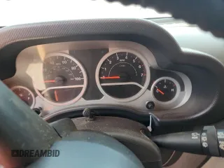 2007 Jeep Wrangler Unlimited Sahara с VIN 1J4GA59167L183198, выставлен на аукционе Copart как лот 62135995 с пробегом Не указан миль и Списание • Salvage title. История ставок и продаж доступна на DreamBid. Изображение 9.