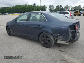 2009 Volkswagen Jetta SE with VIN 3VWRZ71K59M055735, listed as a Copart auction lot 60202485 with 160,196 mi miles and Salvage title. Bid and sale history available at DreamBid. Image 2.