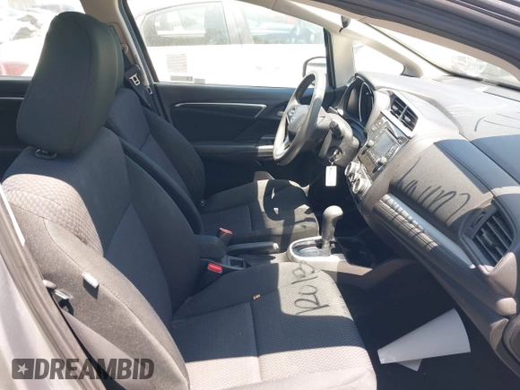 2019 Honda Fit LX z VIN 3HGGK5H42KM733455, wystawiony jako IAAI lot #42644157 z przebiegiem 51 036 mil mil oraz . Historia ofert i sprzedaży dostępna na DreamBid. Obrazek 5.