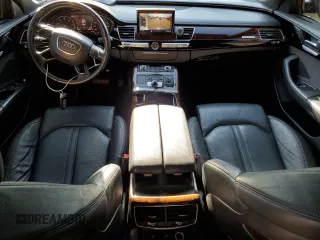 2016 Audi A8 3.0T z VIN WAU34AFD5GN013080, wystawiony jako Copart lot #60356355 z przebiegiem 134 580 mil mil oraz Czysty tytuł • Clean title. Historia ofert i sprzedaży dostępna na DreamBid. Obrazek 8.