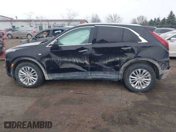 2024 Cadillac XT4 AWD Luxury with VIN 1GYFZBR41RF101697, listed as a IAAI auction lot 41971217 with 16,027 mi miles and . Bid and sale history available at carsss.com. Image 14.