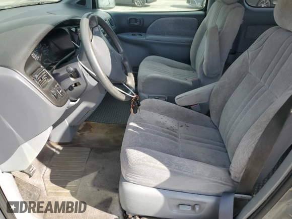 1999 Toyota Sienna LE with VIN 4T3ZF13C6XU128055, listed as a Copart auction lot 81100934 with 0 mi miles and Salvage Title. Bid and sale history available at carsss.com. Image 7.