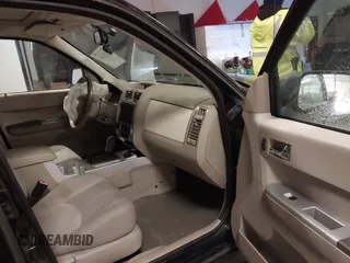 2008 Mercury Mariner with VIN 4M2CU29H18KJ29994, listed as a IAAI auction lot 41336244 with 173,778 mi miles. Bid and sale history available at carsss.com. Image 5.
