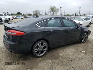 2019 Ford Fusion Titanium with VIN 3FA6P0K97KR254492, listed as a Copart auction lot 54978445 with 99,278 mi miles and Salvage title. Bid and sale history available at DreamBid. Image 3.