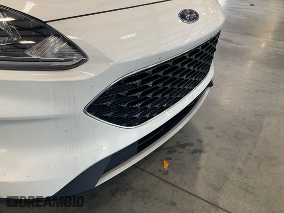 2020 Ford Escape SE z VIN 1FMCU0G62LUB45075, wystawiony jako IAAI lot #42743374 z przebiegiem 84 675 mil mil oraz . Historia ofert i sprzedaży dostępna na DreamBid. Obrazek 6.