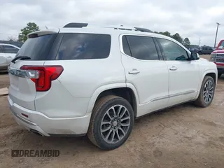 2021 GMC Acadia Denali with VIN 1GKKNPLS1MZ139821, listed as a IAAI auction lot 41455357 with 61,265 mi miles and . Bid and sale history available at carsss.com. Image 4.