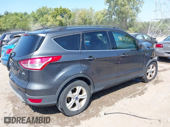 2016 Ford Escape SE with VIN 1FMCU9GX5GUC24730, listed as a IAAI auction lot 40172504 with 139,925 mi miles. Bid and sale history available at carsss.com. Image 4.
