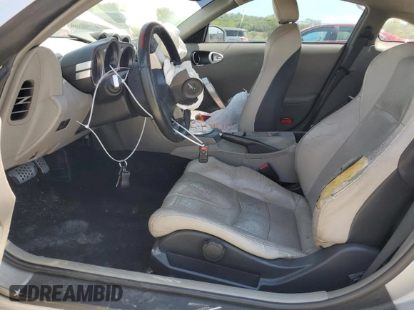2003 Nissan 350Z Touring z VIN JN1AZ34E63T016212, wystawiony jako Copart lot #53799605 z przebiegiem 176 292 mil mil oraz Czysty tytuł • Clean title. Historia ofert i sprzedaży dostępna na DreamBid. Obrazek 7.