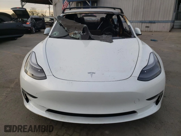 2022 Tesla Model 3 Performance with VIN 5YJ3E1EC3NF265334, listed as a Copart auction lot 84853734 with Not Provided miles and Salvage Title. Bid and sale history available at DreamBid. Image 5.