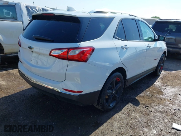 2021 Chevrolet Equinox Premier z VIN 2GNAXNEV9M6120241, wystawiony jako IAAI lot #42222928 z przebiegiem 104 274 mil mil oraz . Historia ofert i sprzedaży dostępna na DreamBid. Obrazek 4.