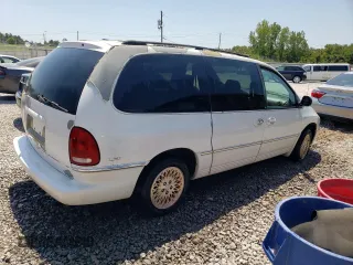 1996 Chrysler Town & Country LXi with VIN 1C4GP64L1TB455059, listed as a Copart auction lot 62001184 with Not Provided miles and Salvage Title. Bid and sale history available at carsss.com. Image 3.