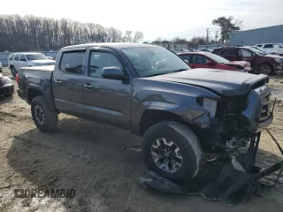 2022 Toyota Tacoma SR z VIN 3TMCZ5ANXNM473533, wystawiony jako Copart lot #46214655 z przebiegiem 42 660 mil mil oraz Szkoda całkowita • Salvage title. Historia ofert i sprzedaży dostępna na DreamBid. Obrazek 4.