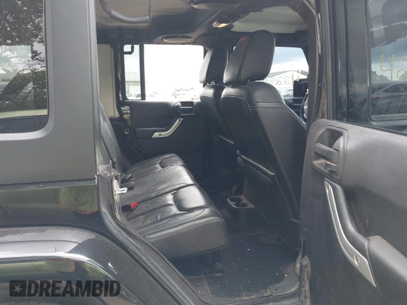 2013 Jeep Wrangler Unlimited Sahara with VIN 1C4BJWEG2DL549864, listed as a IAAI auction lot 42250556 with 231,018 mi miles and . Bid and sale history available at DreamBid. Image 8.