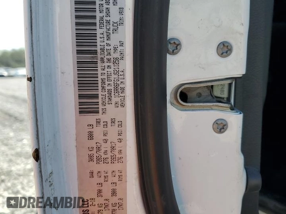 2018 Ram 1500 Tradesman z VIN 1C6RR6FG1JS211256, wystawiony jako Copart lot #49769185 z przebiegiem 171 115 mil mil oraz Szkoda całkowita • Salvage title. Historia ofert i sprzedaży dostępna na DreamBid. Obrazek 12.