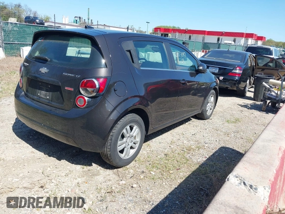 2014 Chevrolet Sonic LT with VIN 1G1JC6SB6E4210561, listed as a IAAI auction lot 42073197 with 100,945 mi miles. Bid and sale history available at carsss.com. Image 4.