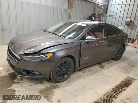 2017 Ford Fusion Hybrid SE z VIN 3FA6P0LU4HR226127, wystawiony jako Copart lot #50496455 z przebiegiem 98 027 mil mil oraz Szkoda całkowita • Salvage title. Historia ofert i sprzedaży dostępna na DreamBid. Obrazek 1.