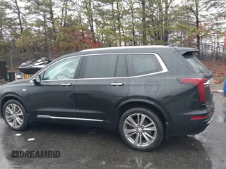 2022 Cadillac XT6 Premium Luxury z VIN 1GYKPDRS8NZ161368, wystawiony jako IAAI lot #41115620 z przebiegiem 140 819 mil mil oraz . Historia ofert i sprzedaży dostępna na DreamBid. Obrazek 14.
