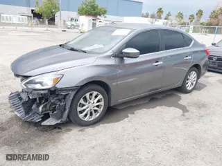 2019 Nissan Sentra S with VIN 3N1AB7AP2KY451283, listed as a IAAI auction lot 41775863 with 104,419 mi miles. Bid and sale history available at carsss.com. Image 2.