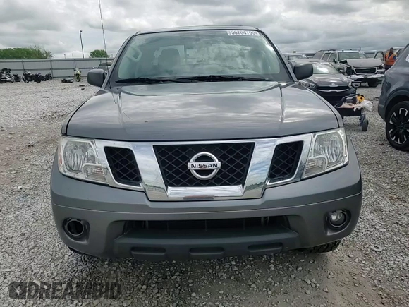 2019 Nissan Frontier SV with VIN 1N6AD0EV9KN701104, listed as a Copart auction lot 56704705 with 76,882 mi miles and Salvage title. Bid and sale history available at DreamBid. Image 14.