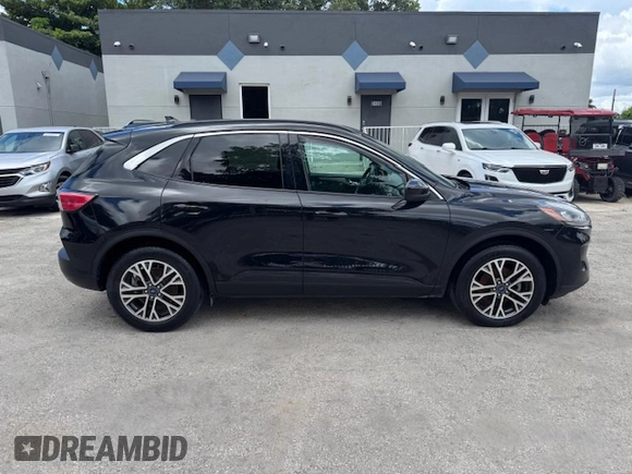 2020 Ford Escape SEL with VIN 1FMCU0H61LUB07822, listed as a Copart auction lot 62612175 with 65,721 mi miles and Salvage title. Bid and sale history available at DreamBid. Image 13.