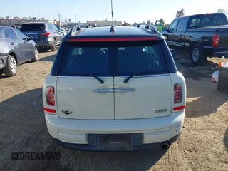 2012 MINI Clubman z VIN WMWZF3C58CT189866, wystawiony jako IAAI lot #41637796 z przebiegiem 97 073 mil mil oraz . Historia ofert i sprzedaży dostępna na DreamBid. Obrazek 16.