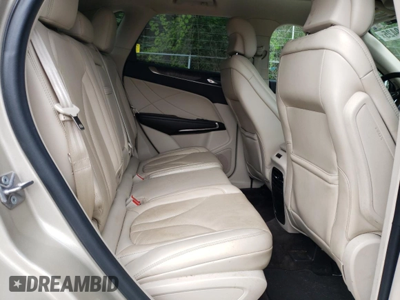 2017 Lincoln MKC Reserve z VIN 5LMCJ3D95HUL47499, wystawiony jako Copart lot #65549425 z przebiegiem 80 740 mil mil oraz Czysty tytuł • Clean title. Historia ofert i sprzedaży dostępna na DreamBid. Obrazek 11.
