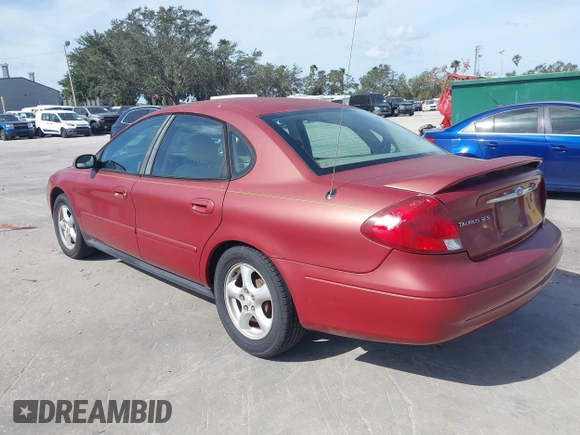 2002 Ford Taurus SES Standard with VIN 1FAFP55S42A135871, listed as a IAAI auction lot 40822596 with 185,605 mi miles. Bid and sale history available at carsss.com. Image 3.
