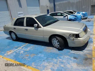 2005 Mercury Grand Marquis LS Premium z VIN 2MEFM75W45X636559, wystawiony jako Copart lot #54424415 z przebiegiem 129 643 mil mil oraz Szkoda całkowita • Salvage title. Historia ofert i sprzedaży dostępna na DreamBid. Obrazek 4.