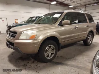 2004 Honda Pilot EX with VIN 2HKYF18464H567384, listed as a IAAI auction lot 41790773 with 142,534 mi miles. Bid and sale history available at carsss.com. Image 2.