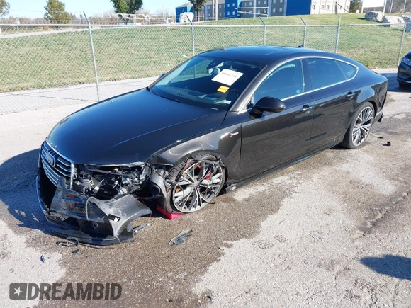 2016 Audi A7 Prestige z VIN WAU2GAFC5GN169534, wystawiony jako IAAI lot #40802384 z przebiegiem 103 263 mil mil oraz . Historia ofert i sprzedaży dostępna na DreamBid. Obrazek 2.